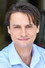Adam D. Crain